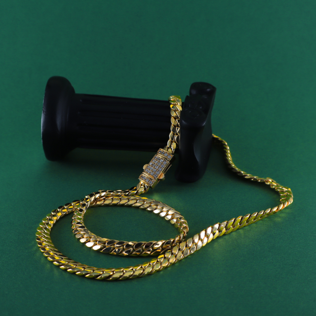 Cadena barbada signature 18K