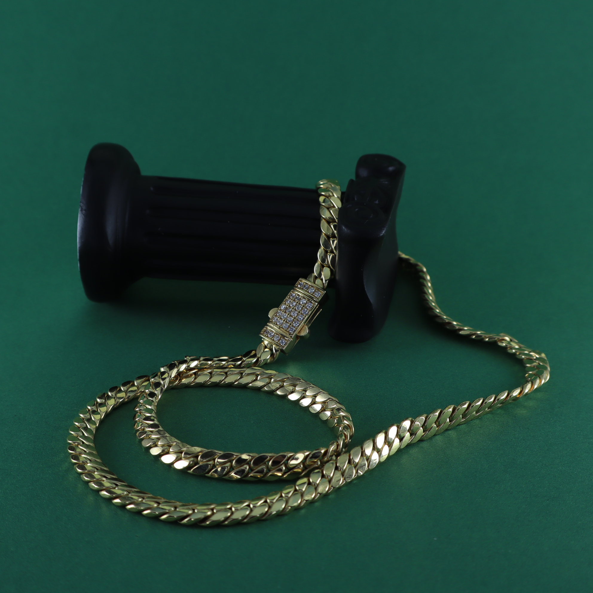 Cadena barbada signature 18K