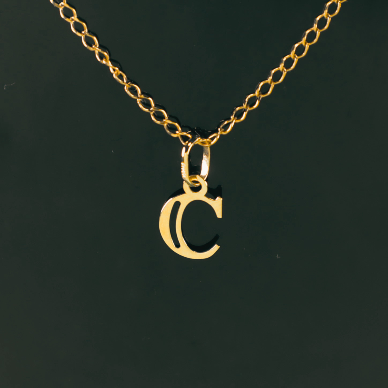 Colgante Inicial C 18K