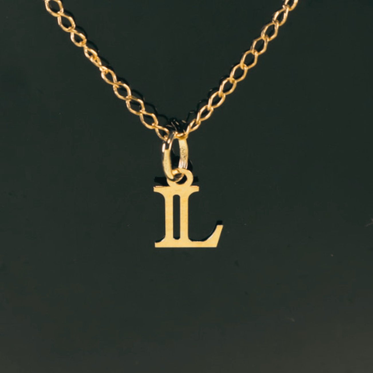 Colgante Inicial L 18K