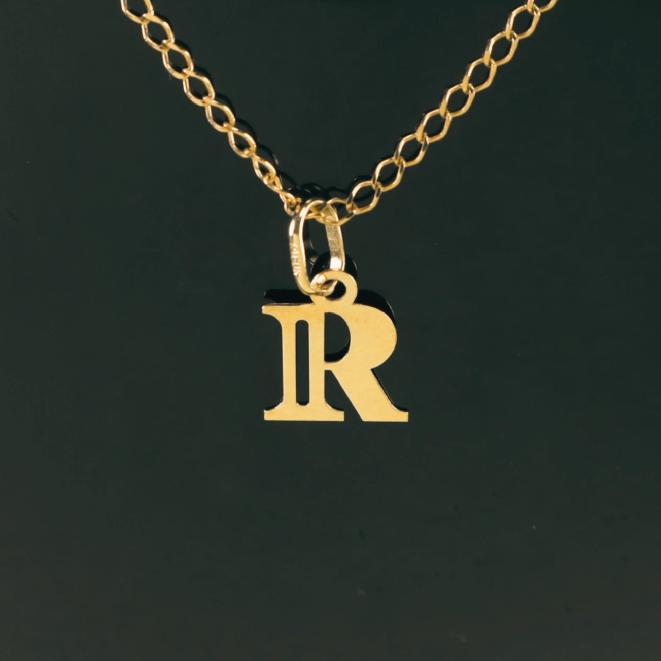 Colgante Inicial R 18K