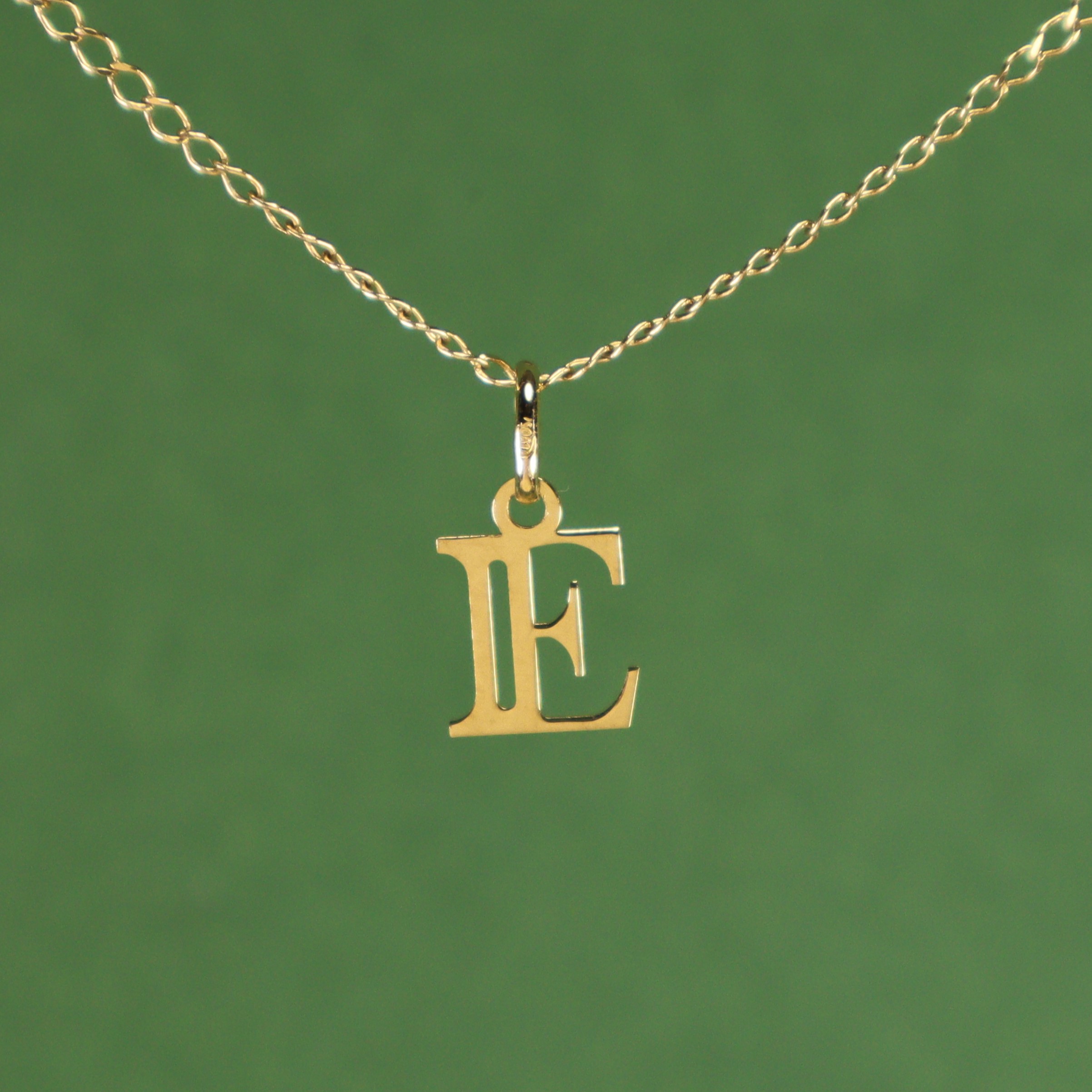 Colgante Inicial E 18K