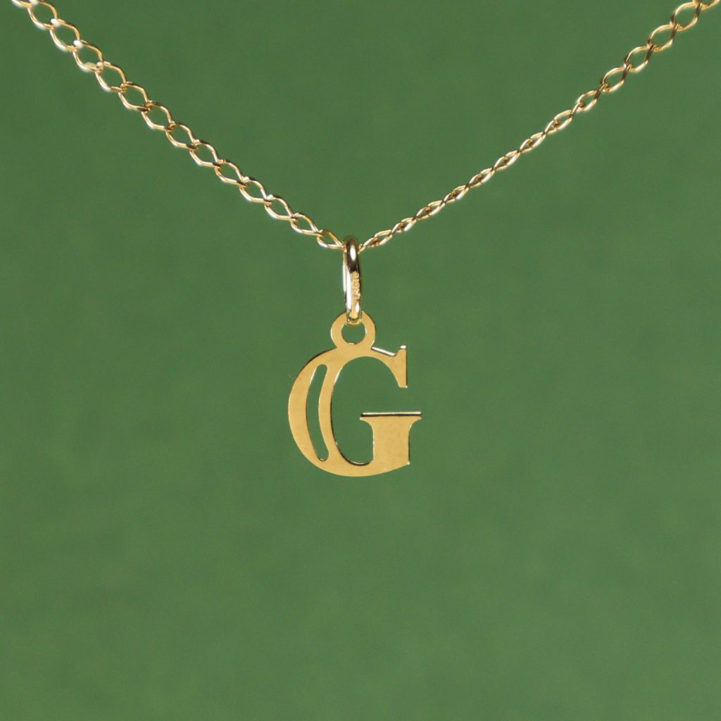 Colgante Inicial G 18K