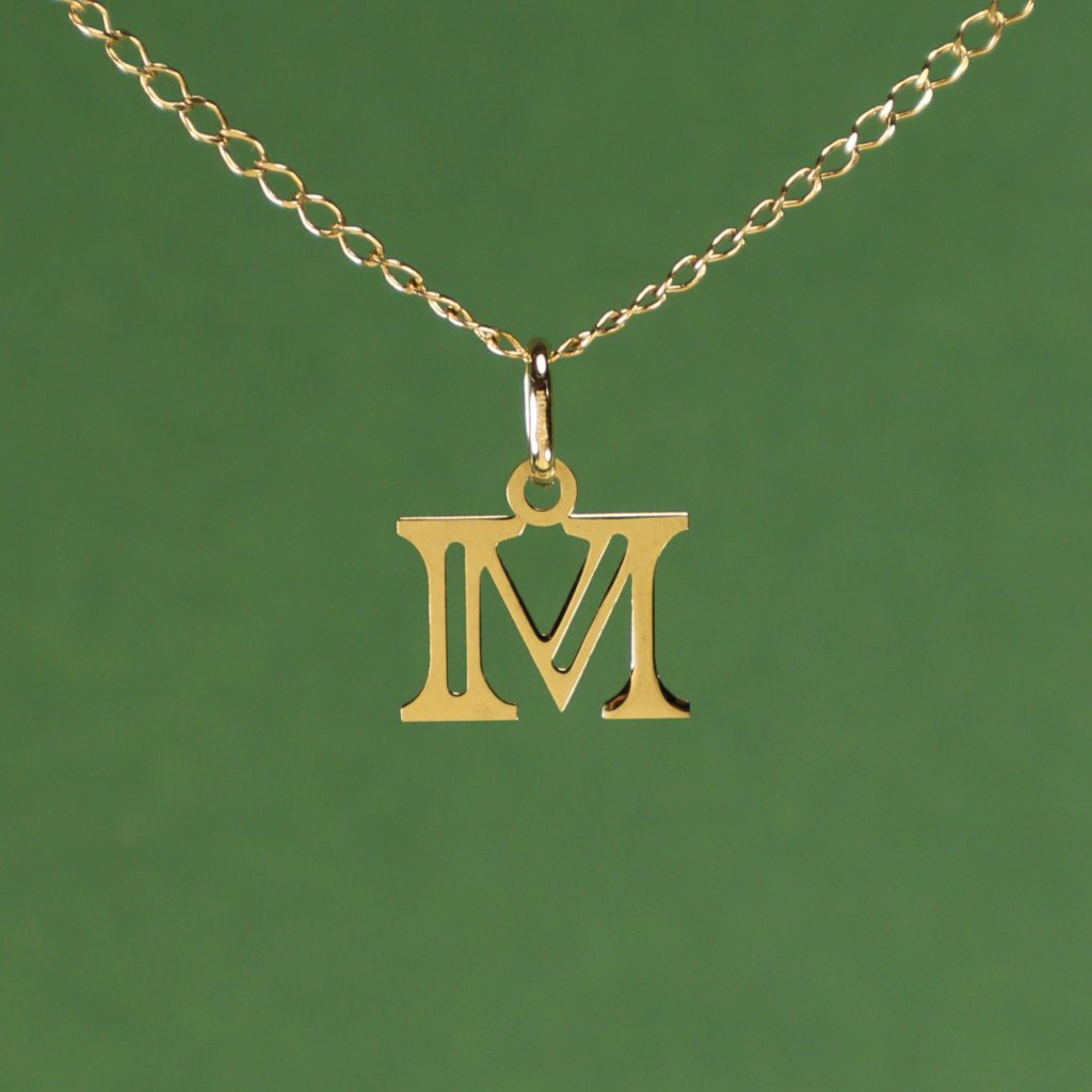 Colgante Inicial M 18K