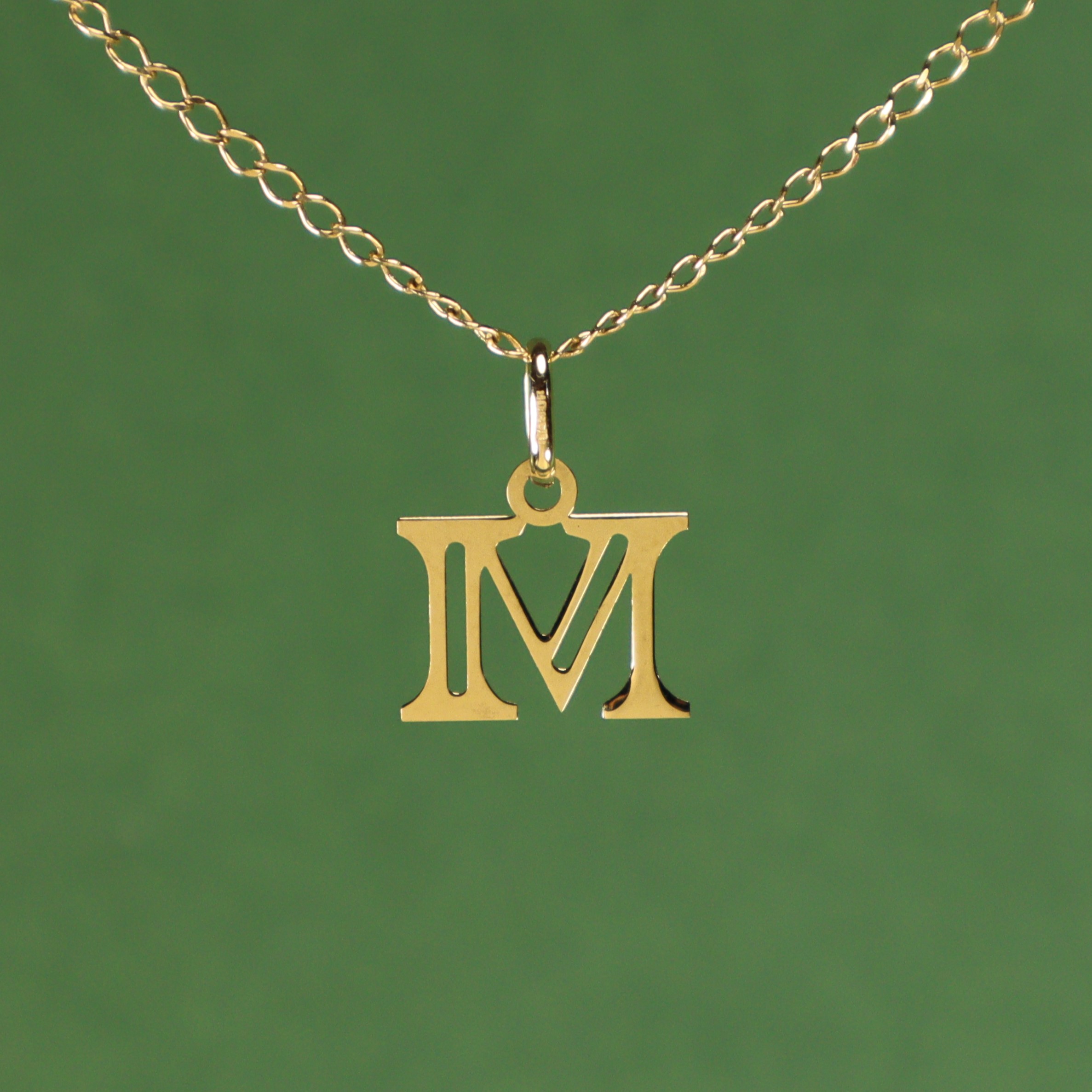 Colgante Inicial M 18K
